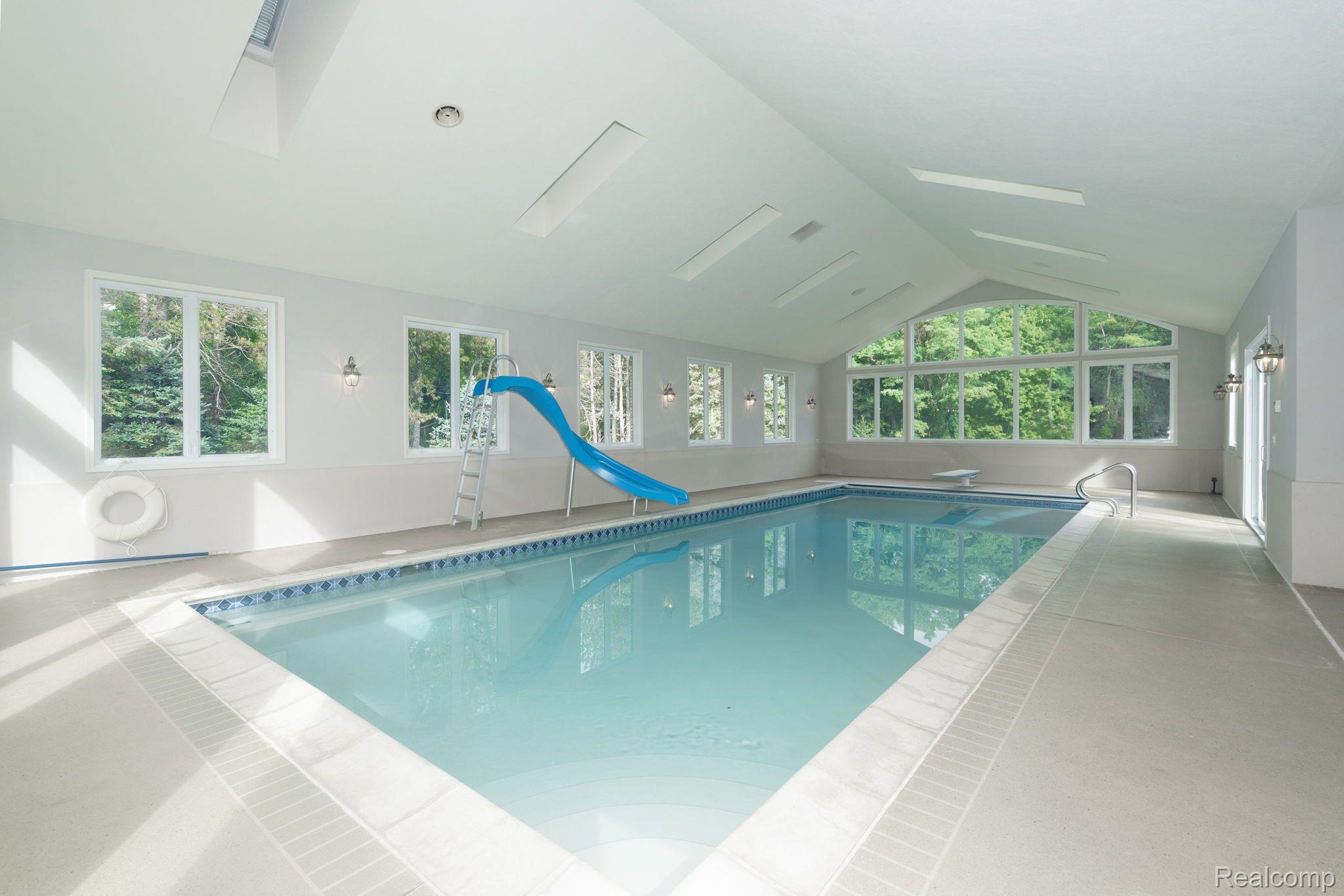 3105 McKail Road Romeo, MI 48065 - Photo 52 of 58 9ft deep inground pool with slide and diving board