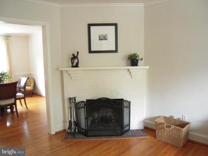 3702 Kimble Road Baltimore, MD 21218 - Photo 3 of 10 a living room with furniture and a fireplace