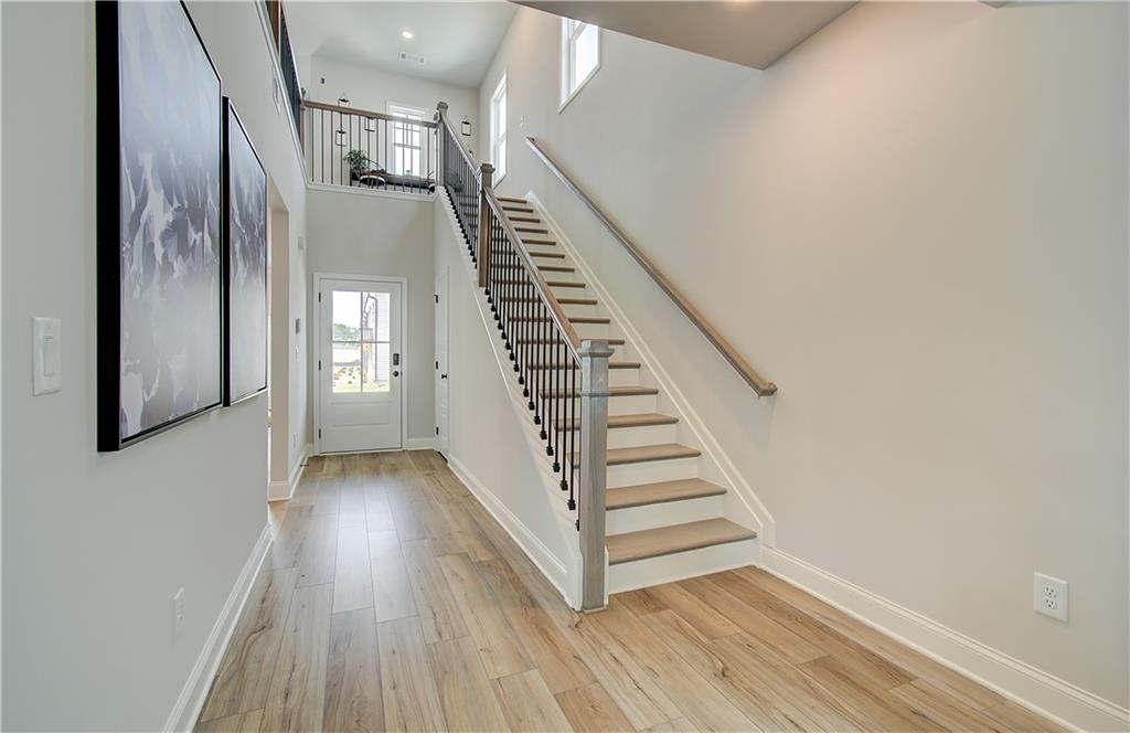 31 Butternut Way Auburn, GA 30011 - Photo 2 of 35 a view of a hallway with wooden floor and entryway