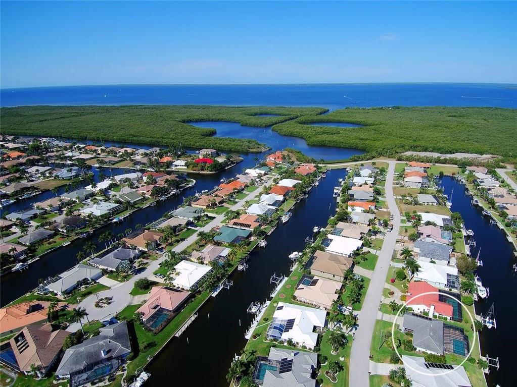 ONE OF THE BEST BOATING LOCATIONS IN PGI! QUICK SAILBOAT ACCESS IN MERE MINUTES TO CHARLOTTE HARBOR LEADING TO THE GULF OF MEXICO VIA PONCE INLET!