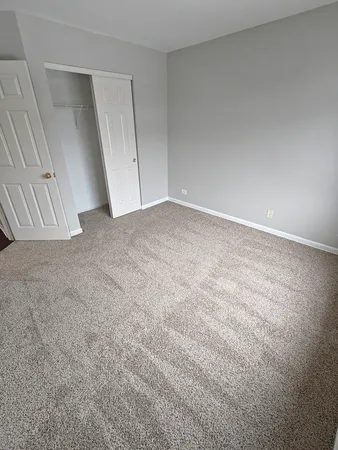 an empty room with a natural light