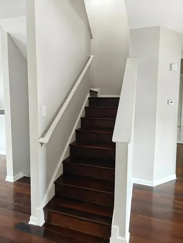 a view of entryway with wooden floor