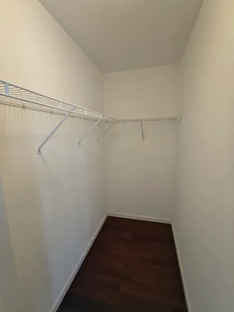 a view of a room with racks on the wall