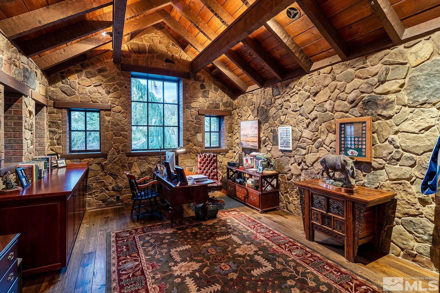 95 Bear Mountain Place Reno, NV 89519 - Photo 29 of 33 a living room with lots of furniture and clutter