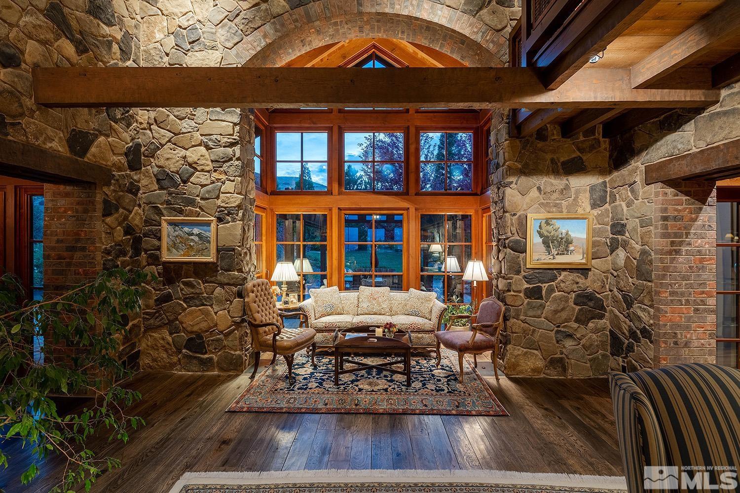 95 Bear Mountain Place Reno, NV 89519 - Photo 8 of 33 a view of a chairs and table in a patio