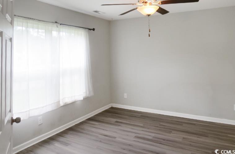 204 Rosedale Drive Aynor, SC 29511 - Photo 12 of 23 Primary Bedroom featuring wood finished floors and a ceiling fan