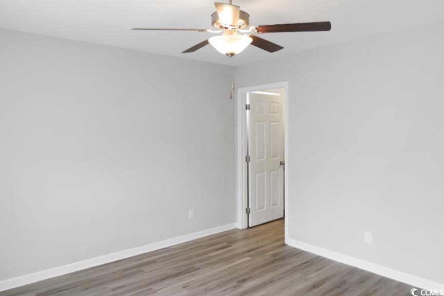 204 Rosedale Drive Aynor, SC 29511 - Photo 13 of 23 Primary Bedroom with wood finished floors and ceiling fan