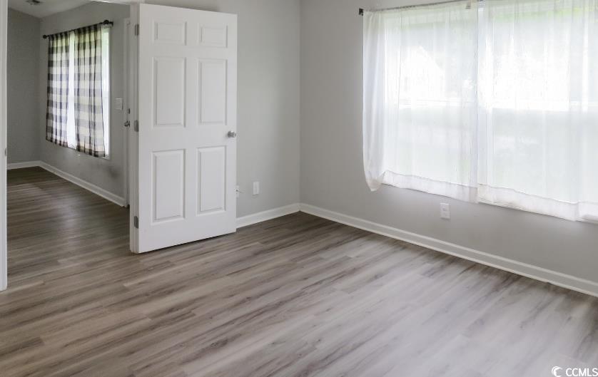 204 Rosedale Drive Aynor, SC 29511 - Photo 15 of 23 Primary Bedroom with baseboards and wood finished floors