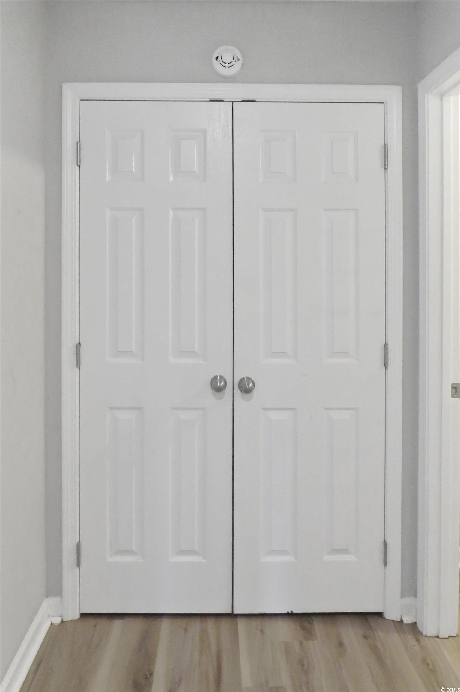 204 Rosedale Drive Aynor, SC 29511 - Photo 22 of 23 Spacious closet in hallway can serve as additional pantry as it's located by the kitchen OR serve as a linen closet.