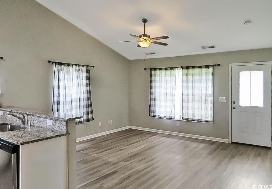 204 Rosedale Drive Aynor, SC 29511 - Photo 10 of 23 Foyer entrance featuring light wood-style floors, lofted ceiling, and a ceiling fan