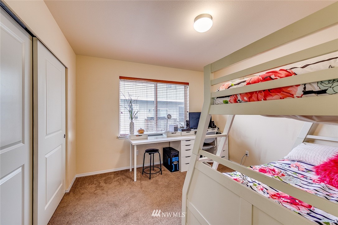 288 East Fulton Way Bremerton, WA 98310 - Photo 22 of 25 a view of a workspace with furniture and a window