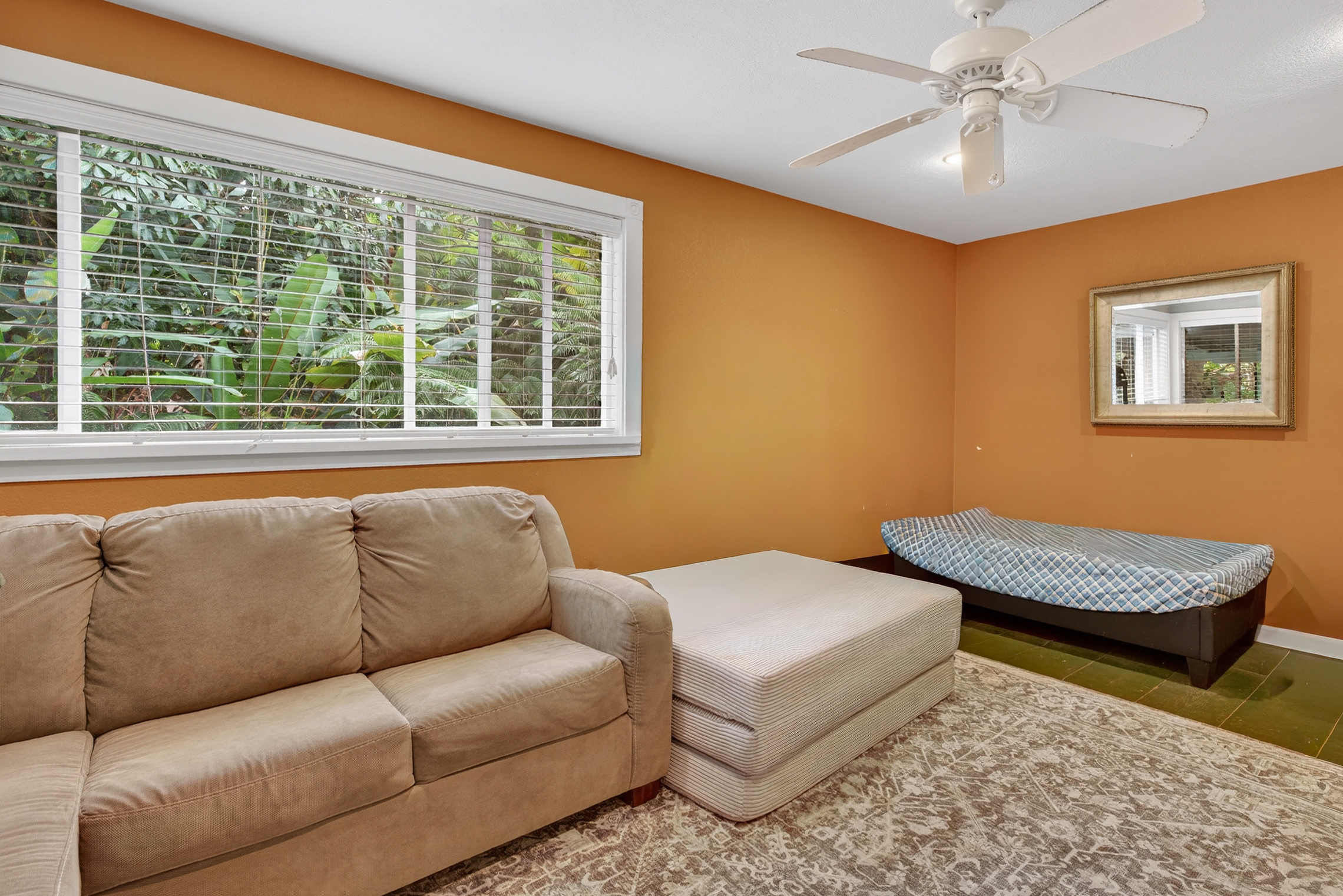 83-5531 Hawaii Belt Road Captain Cook, HI 96704 - Photo 13 of 30 a living room with furniture and a window