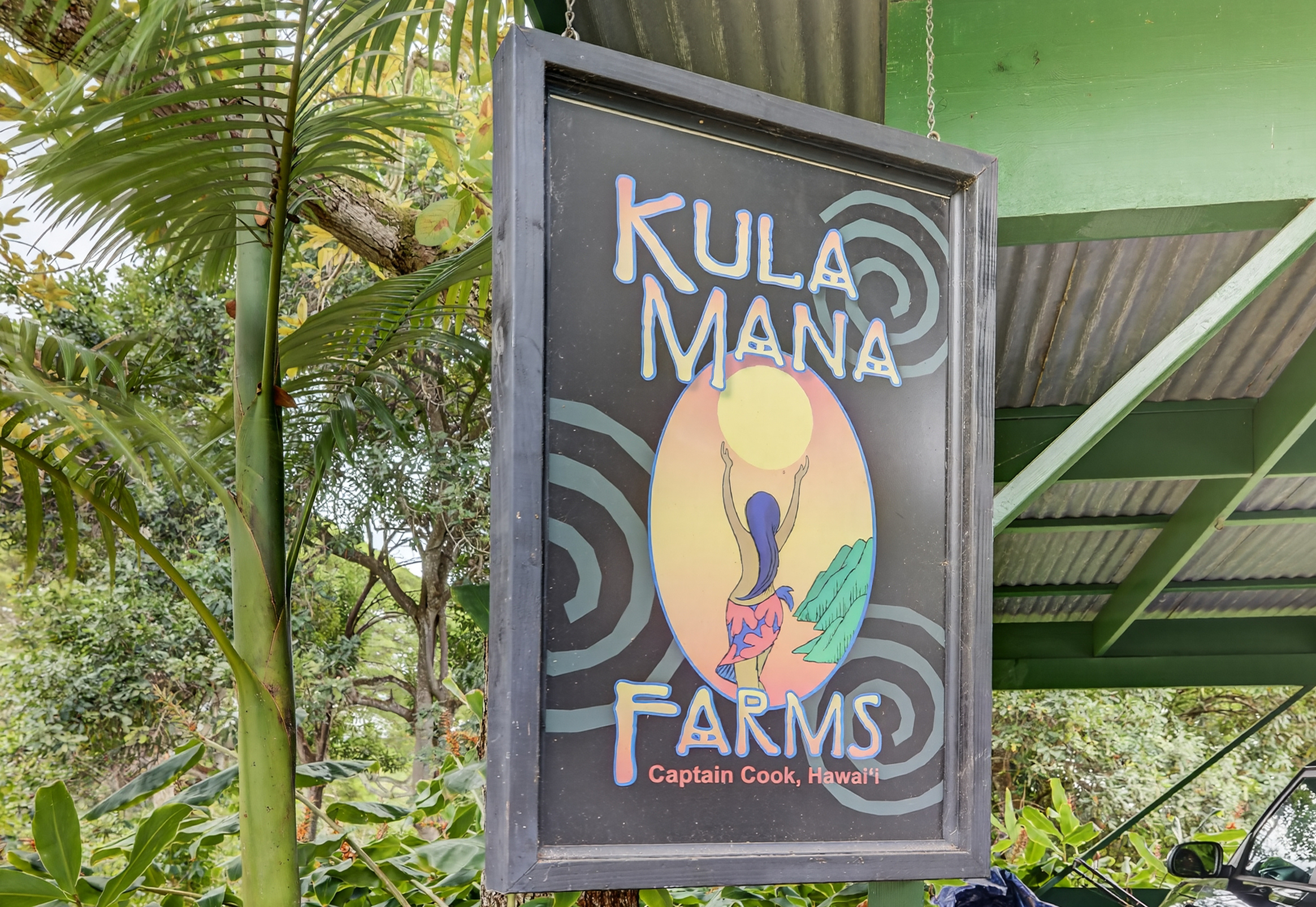 83-5531 Hawaii Belt Road Captain Cook, HI 96704 - Photo 2 of 30 a sign that is on the wall of a building