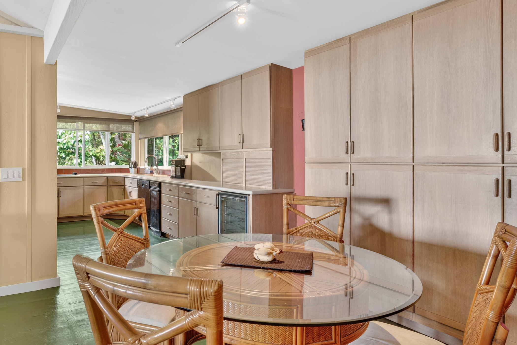 83-5531 Hawaii Belt Road Captain Cook, HI 96704 - Photo 7 of 30 a dining room with furniture and a floor to ceiling window
