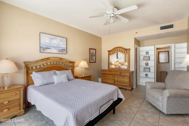 a bathroom with a shower and a window