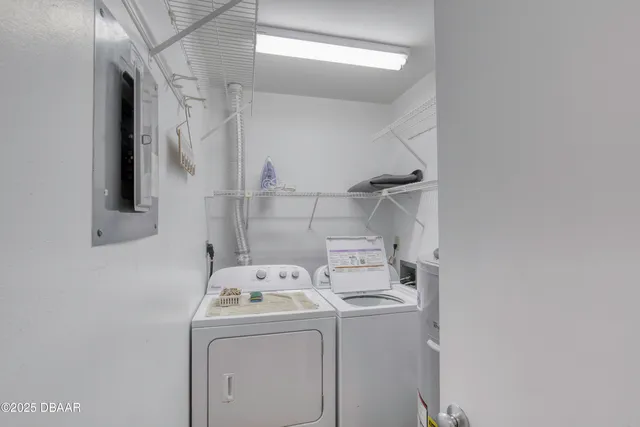 a view of livingroom with furniture and a potted plant
