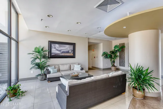 a view of a building with garden and windows