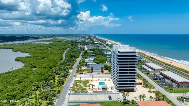 a view of swimming pool with seating space