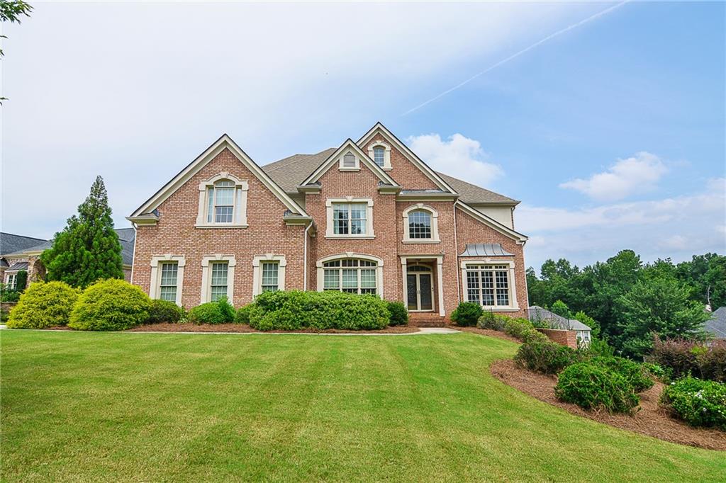 431 Wynns Way Southwest Atlanta, GA 30331 - Photo 1 of 1 a front view of a house with a yard