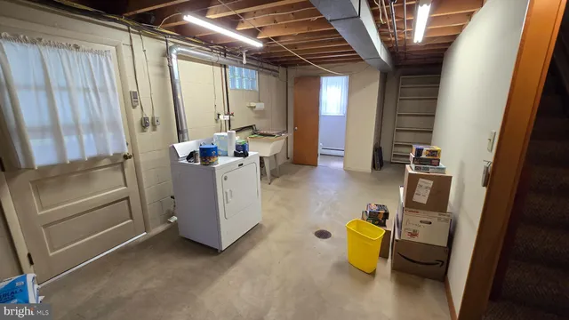 a room with furniture and shower