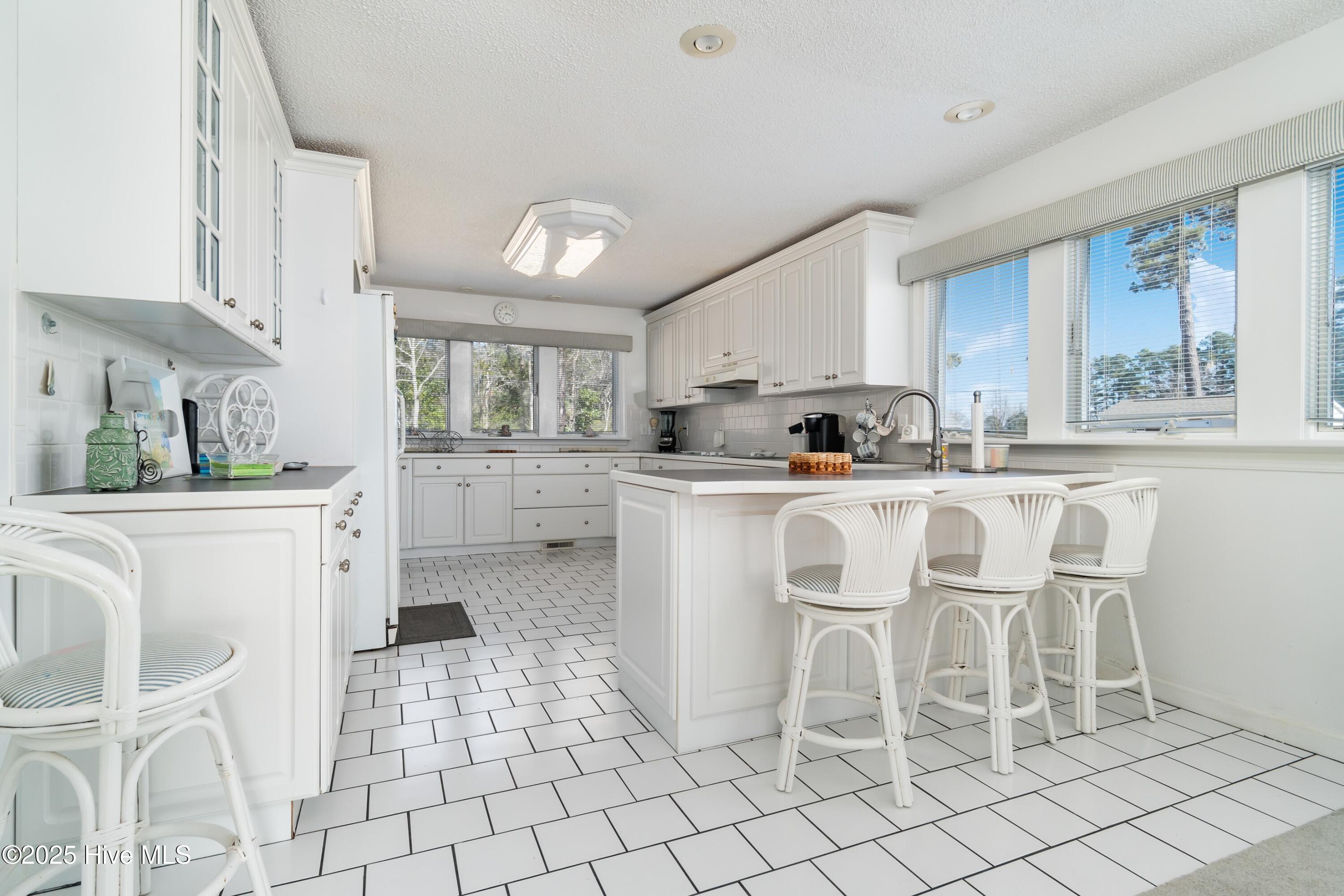 3153 Janiero Road Arapahoe, NC 28510 - Photo 12 of 37 012_Kitchen Area Dining