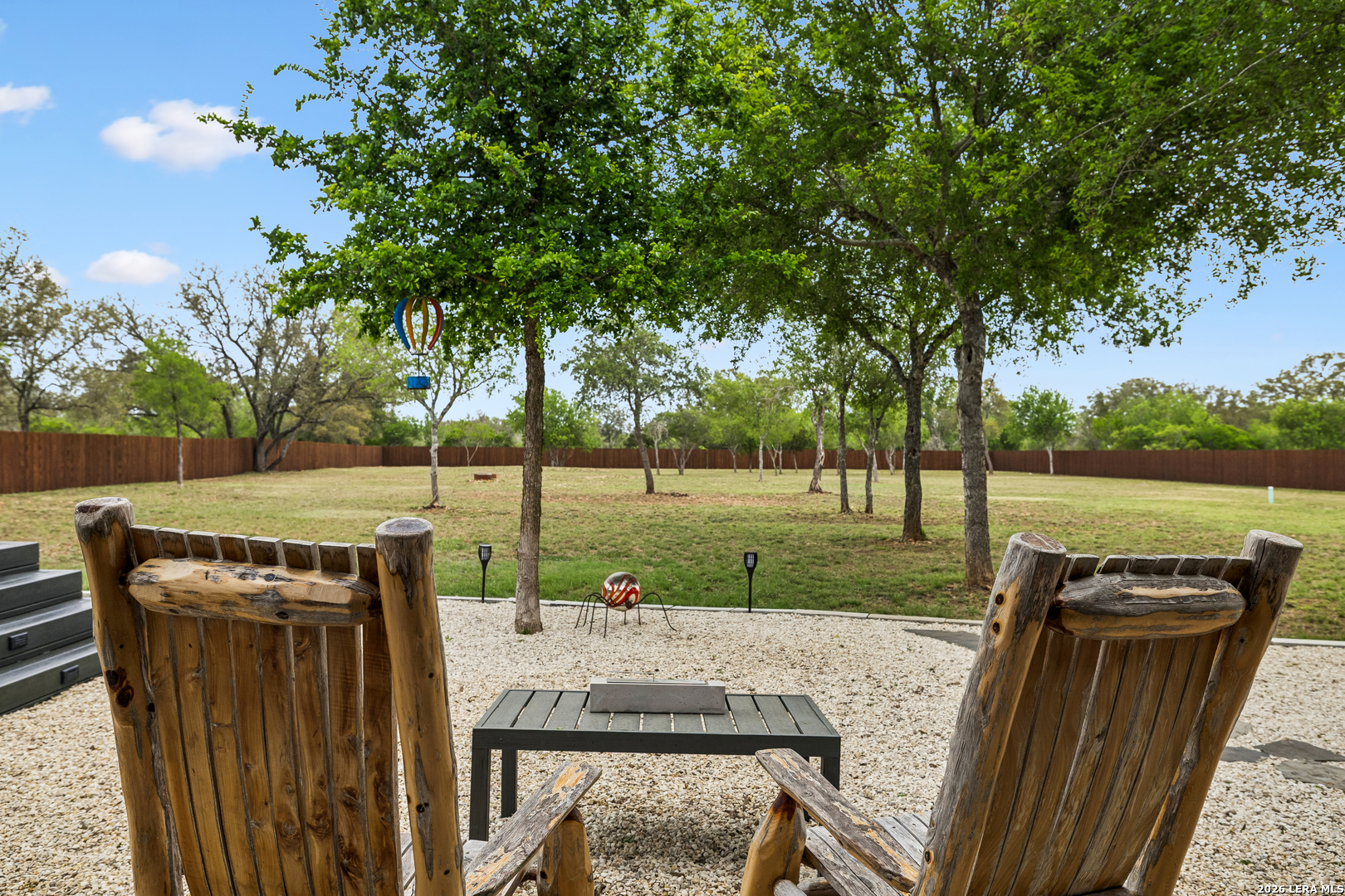 498 Double Gate Road Castroville, TX 78009 - Photo 26 of 28 a view of a chairs and table in the patio
