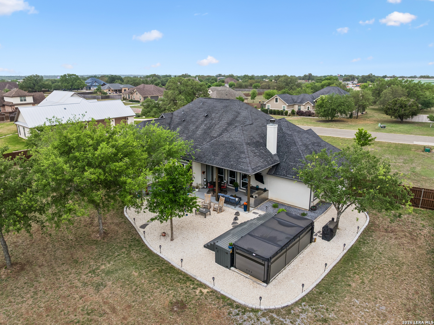 498 Double Gate Road Castroville, TX 78009 - Photo 28 of 28 a view of a bench in front of house