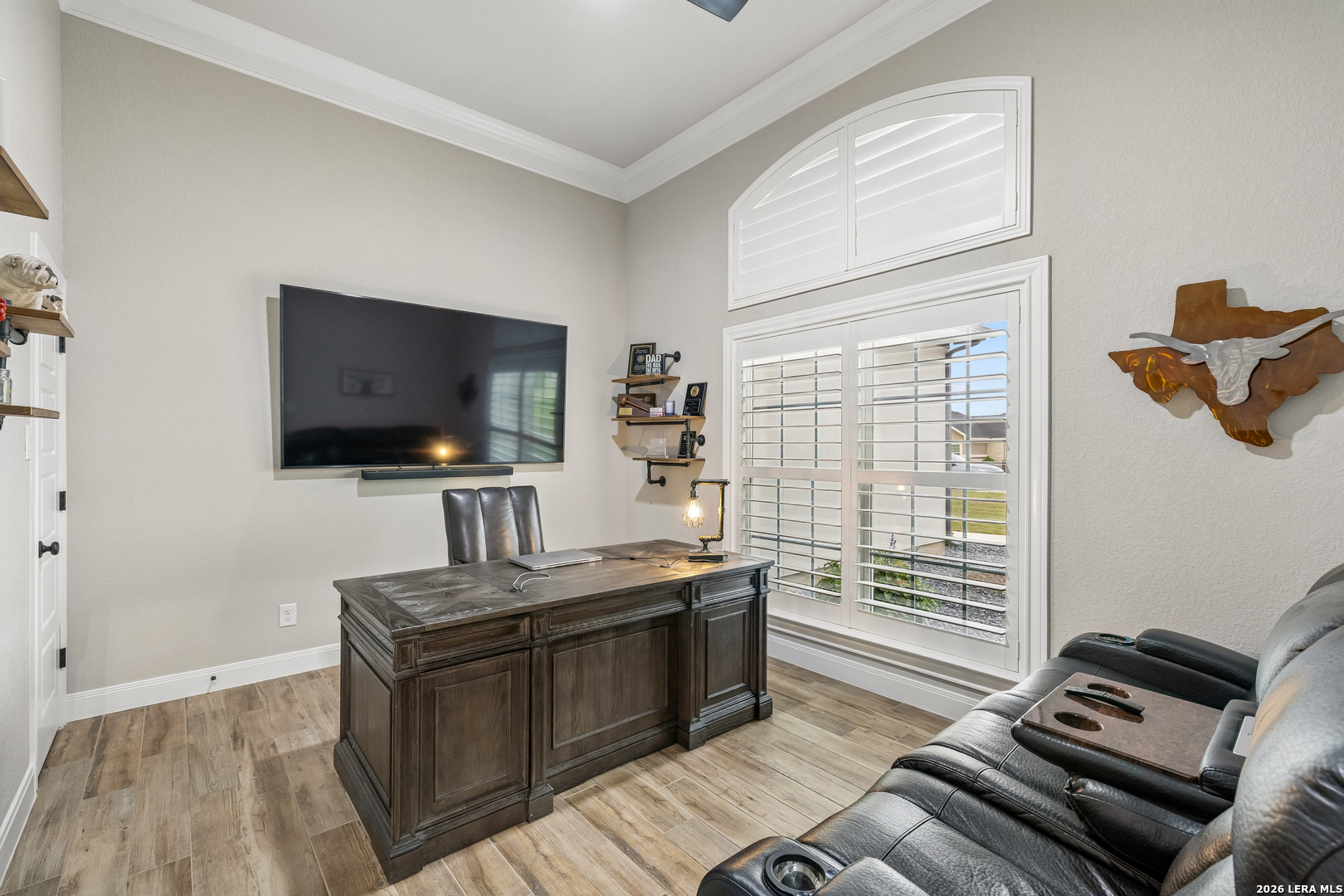 498 Double Gate Road Castroville, TX 78009 - Photo 5 of 28 a kitchen with a stove and a microwave