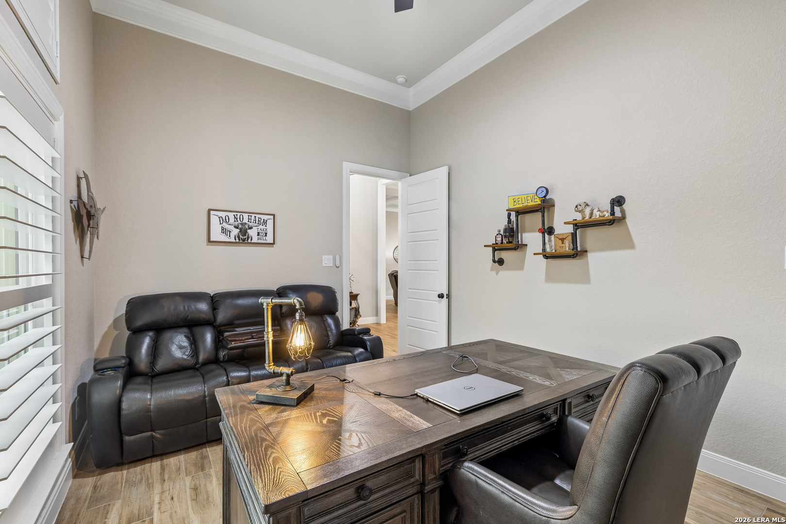 498 Double Gate Road Castroville, TX 78009 - Photo 6 of 28 a workspace with furniture and window