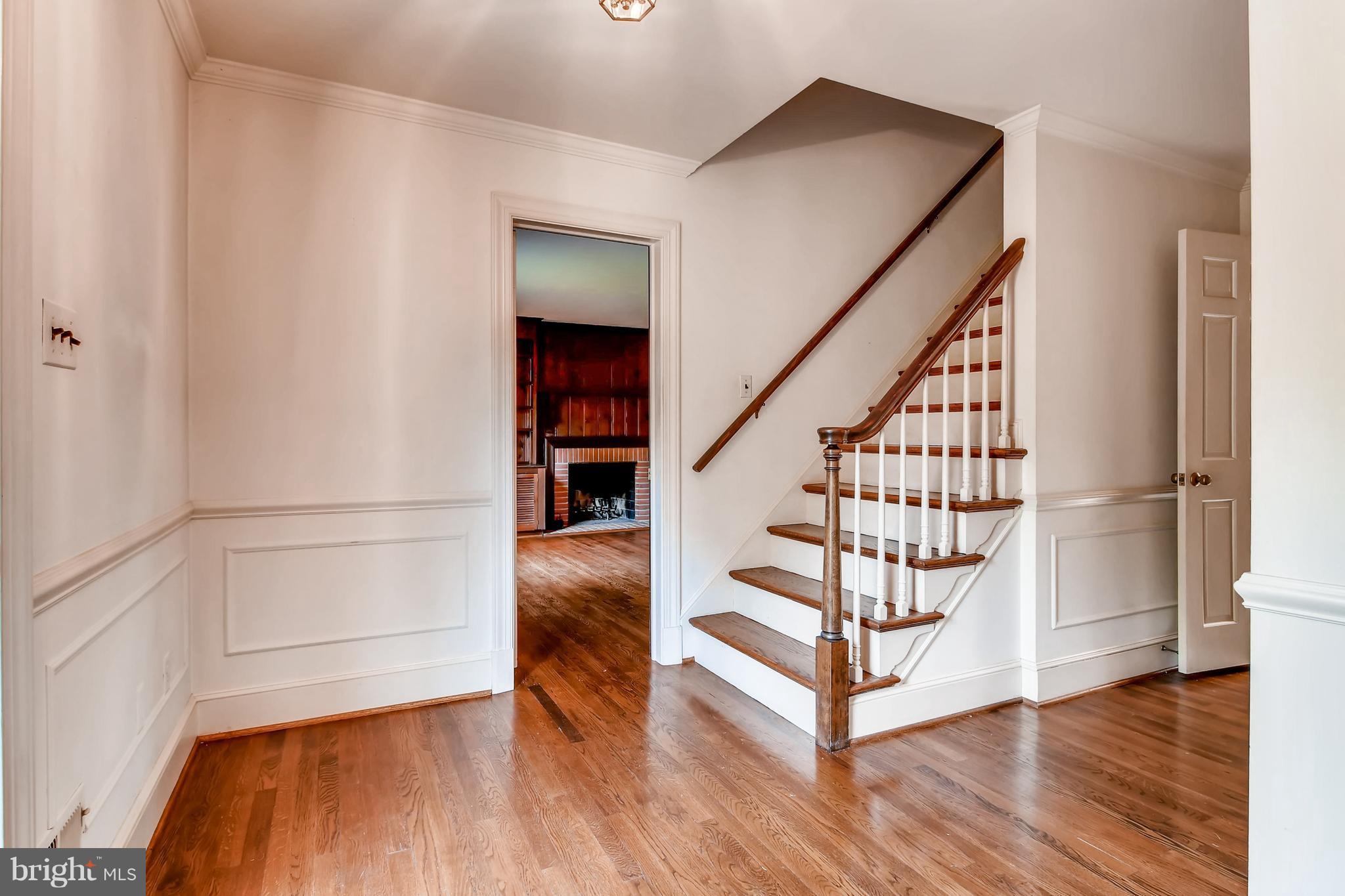 7835 Ellenham Road Baltimore, MD 21204 - Photo 5 of 22 Foyer looking into paneled library.