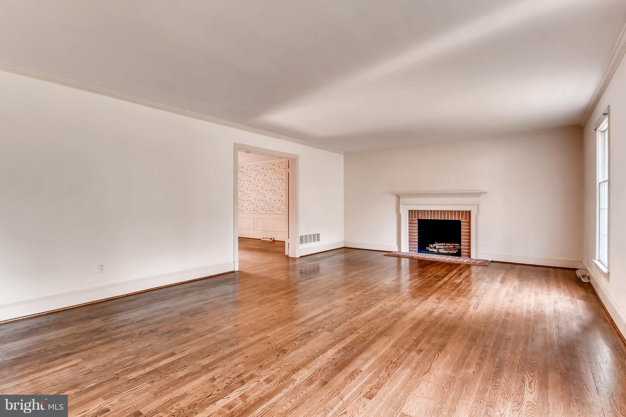7835 Ellenham Road Baltimore, MD 21204 - Photo 6 of 22 ... with one of two wood burning fireplaces.