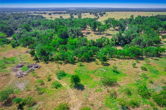 a view of a street with a park