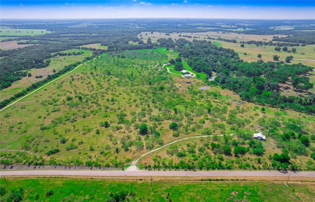 a view of a yard with an ocean