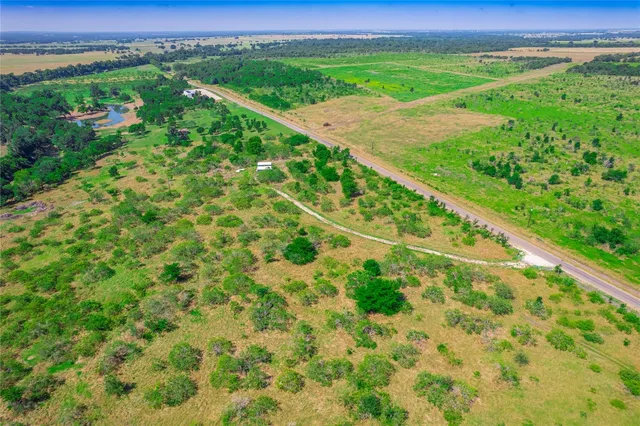 a view of a lush green field