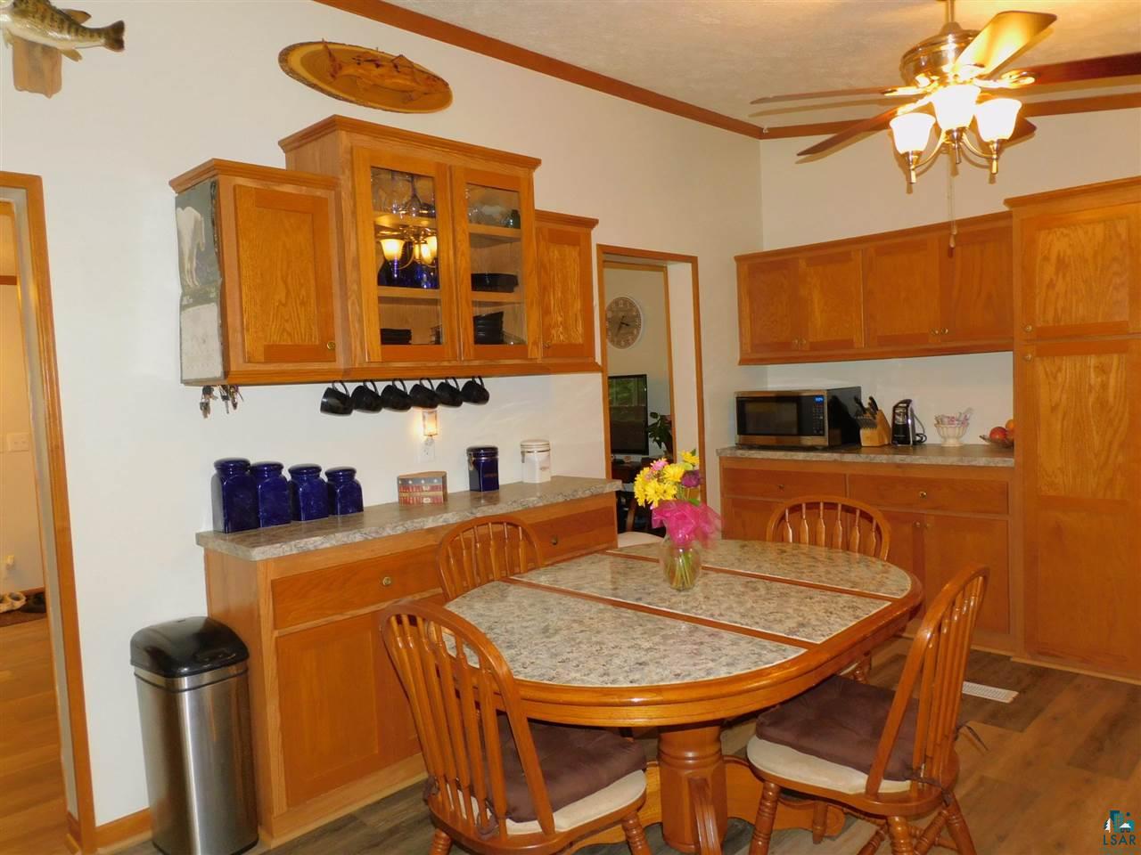 65539 Adler Road Marengo, WI 54855 - Photo 11 of 38 Oak cabinets with pantry