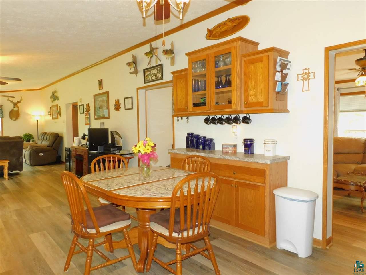 65539 Adler Road Marengo, WI 54855 - Photo 23 of 38 Crown moldings & ornate oak trim throughout home