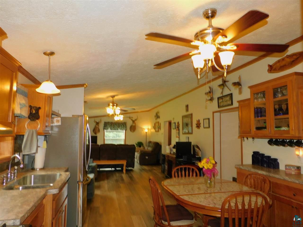 65539 Adler Road Marengo, WI 54855 - Photo 24 of 38 Newer ceiling fans throughout home