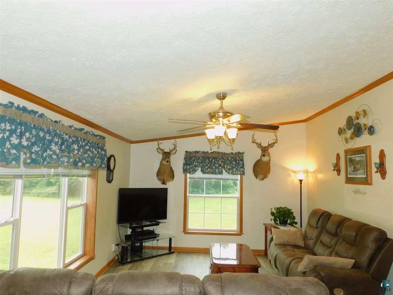 65539 Adler Road Marengo, WI 54855 - Photo 27 of 38 Large windows to view nature