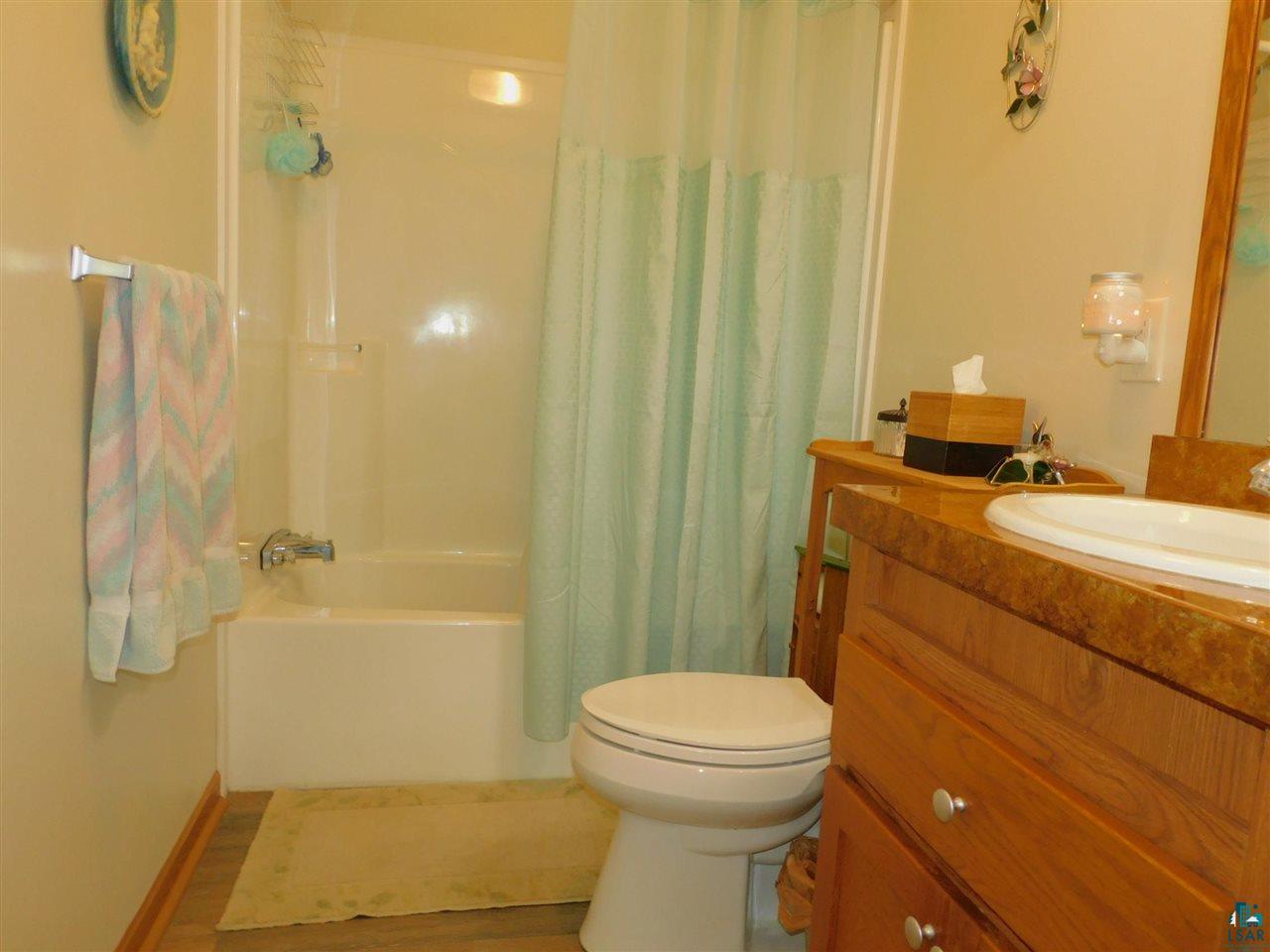 65539 Adler Road Marengo, WI 54855 - Photo 32 of 38 Full bathroom in between two bedrooms