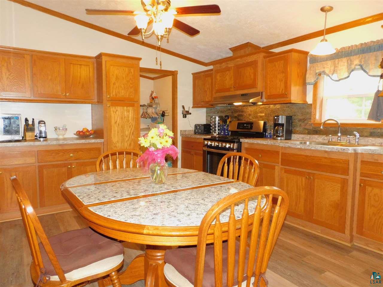 65539 Adler Road Marengo, WI 54855 - Photo 9 of 38 New countertops and kitchen sink