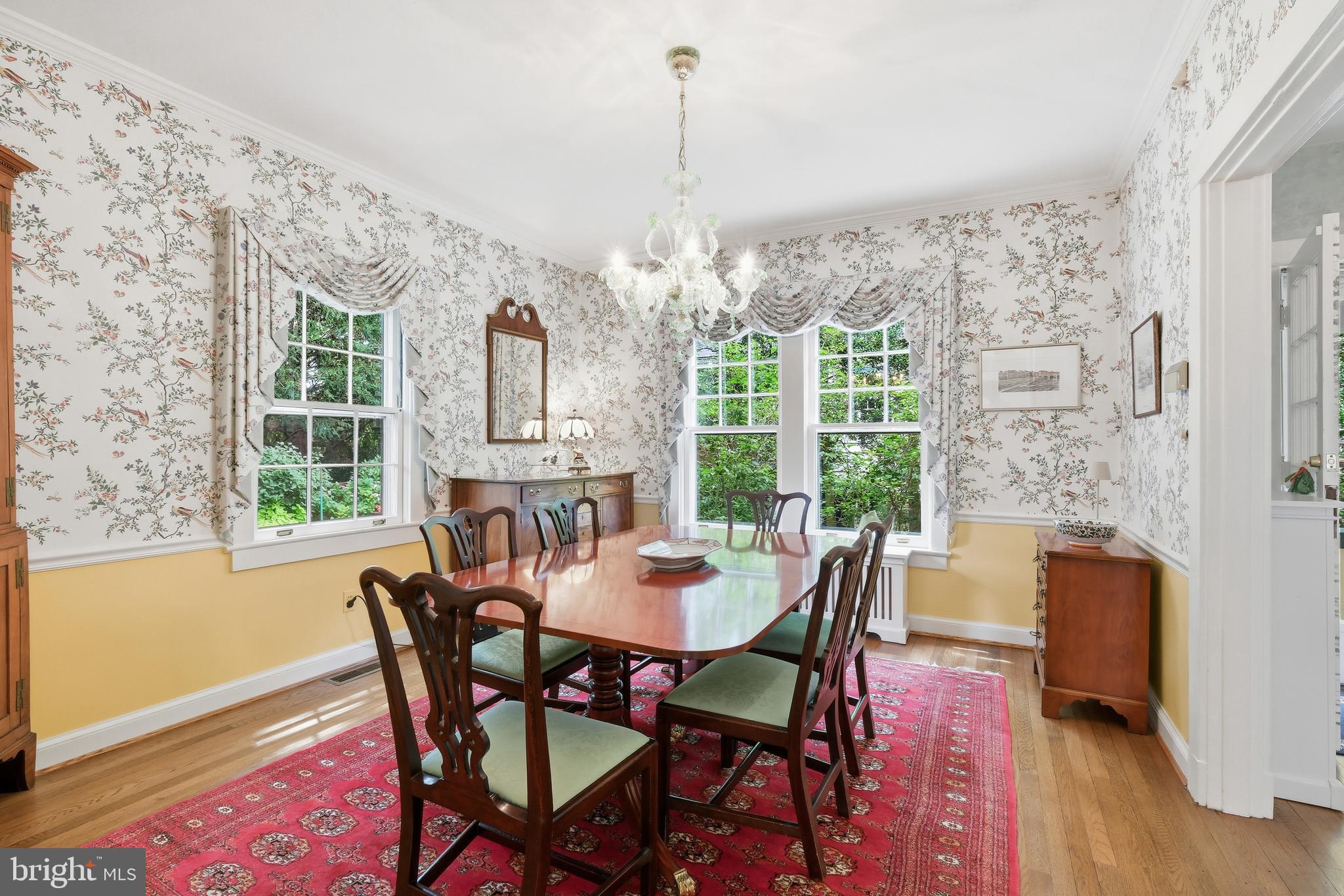 6411 33rd Street Northwest Washington, DC 20015 - Photo 12 of 48 a view of a dining room with furniture window and wooden floor
