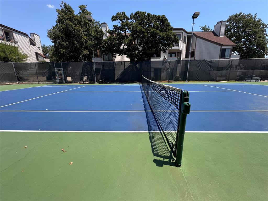 2305 Basil Drive, Unit D108 Arlington, TX 76006 - Photo 14 of 20 a view of a tennis court