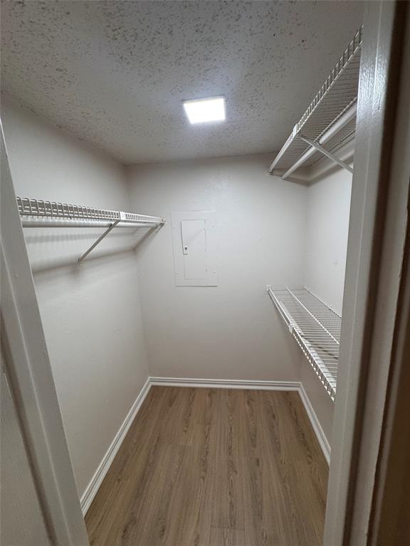 2305 Basil Drive, Unit D108 Arlington, TX 76006 - Photo 7 of 20 wooden floor in an empty room