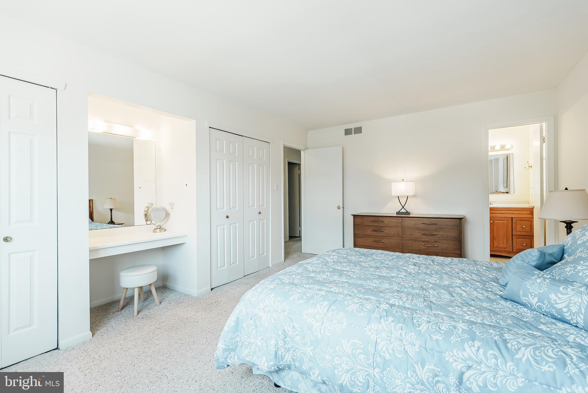 12 Victoria Court Mount Laurel, NJ 08054 - Photo 14 of 31 a large bedroom with a bed and a table chair