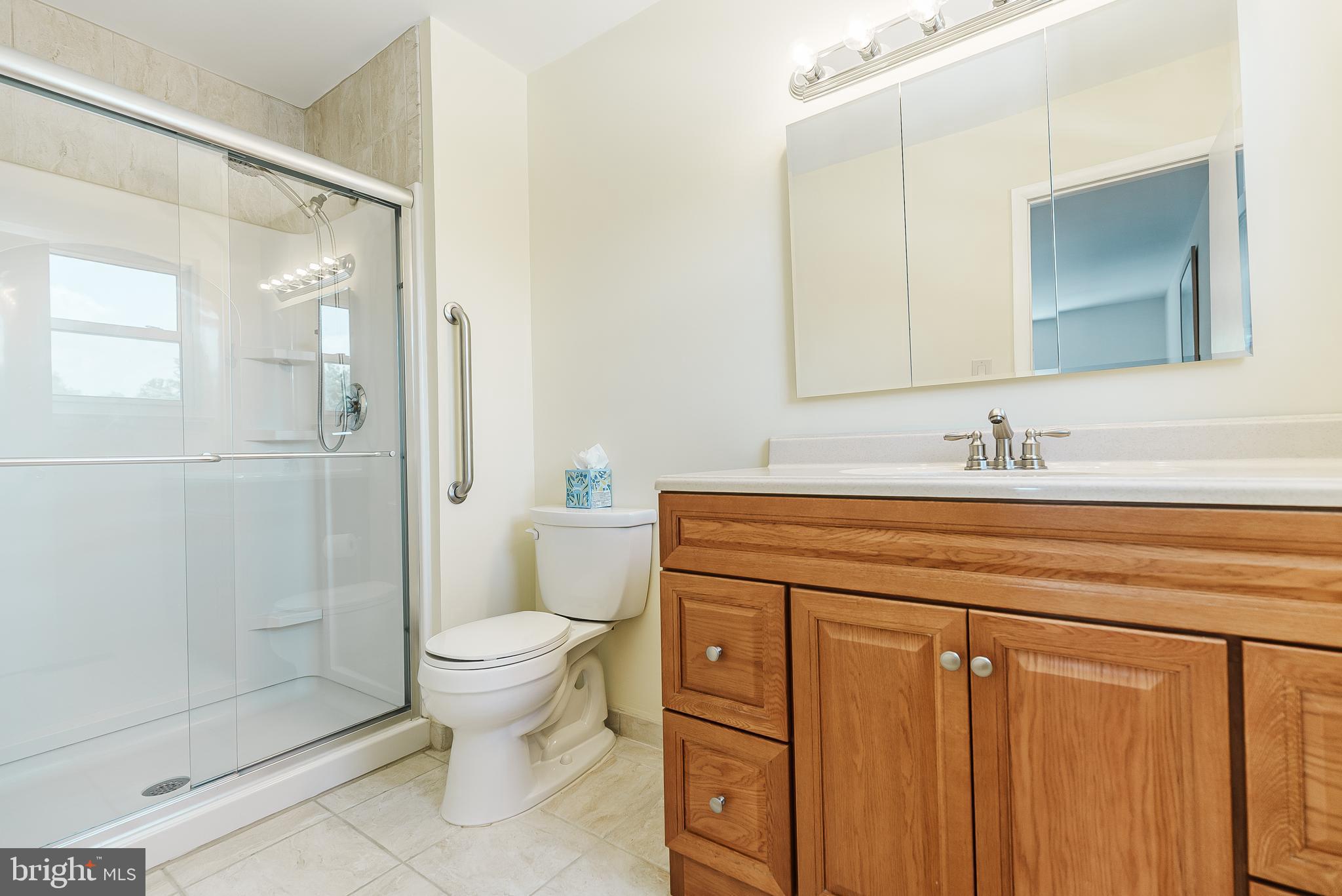 12 Victoria Court Mount Laurel, NJ 08054 - Photo 15 of 31 a bathroom with a sink a toilet and shower