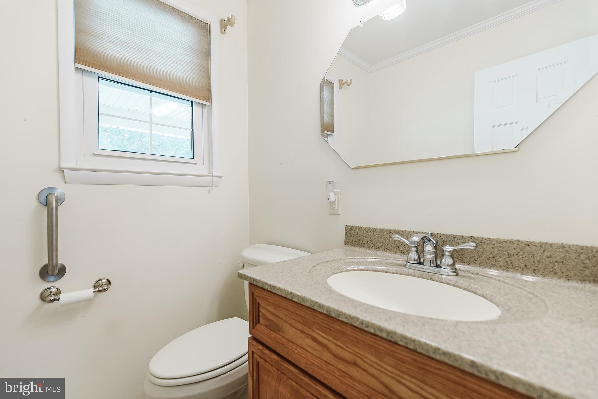 12 Victoria Court Mount Laurel, NJ 08054 - Photo 16 of 31 a bathroom with a toilet a sink a mirror and a shower