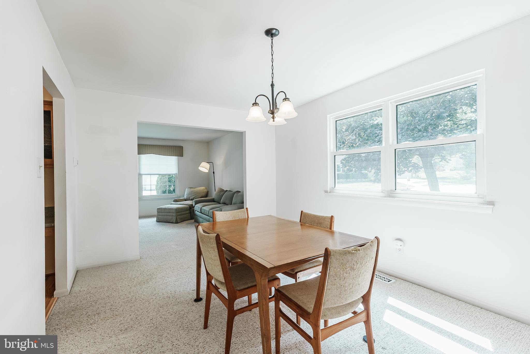 12 Victoria Court Mount Laurel, NJ 08054 - Photo 17 of 31 a view of a dining room with furniture and a chandelier