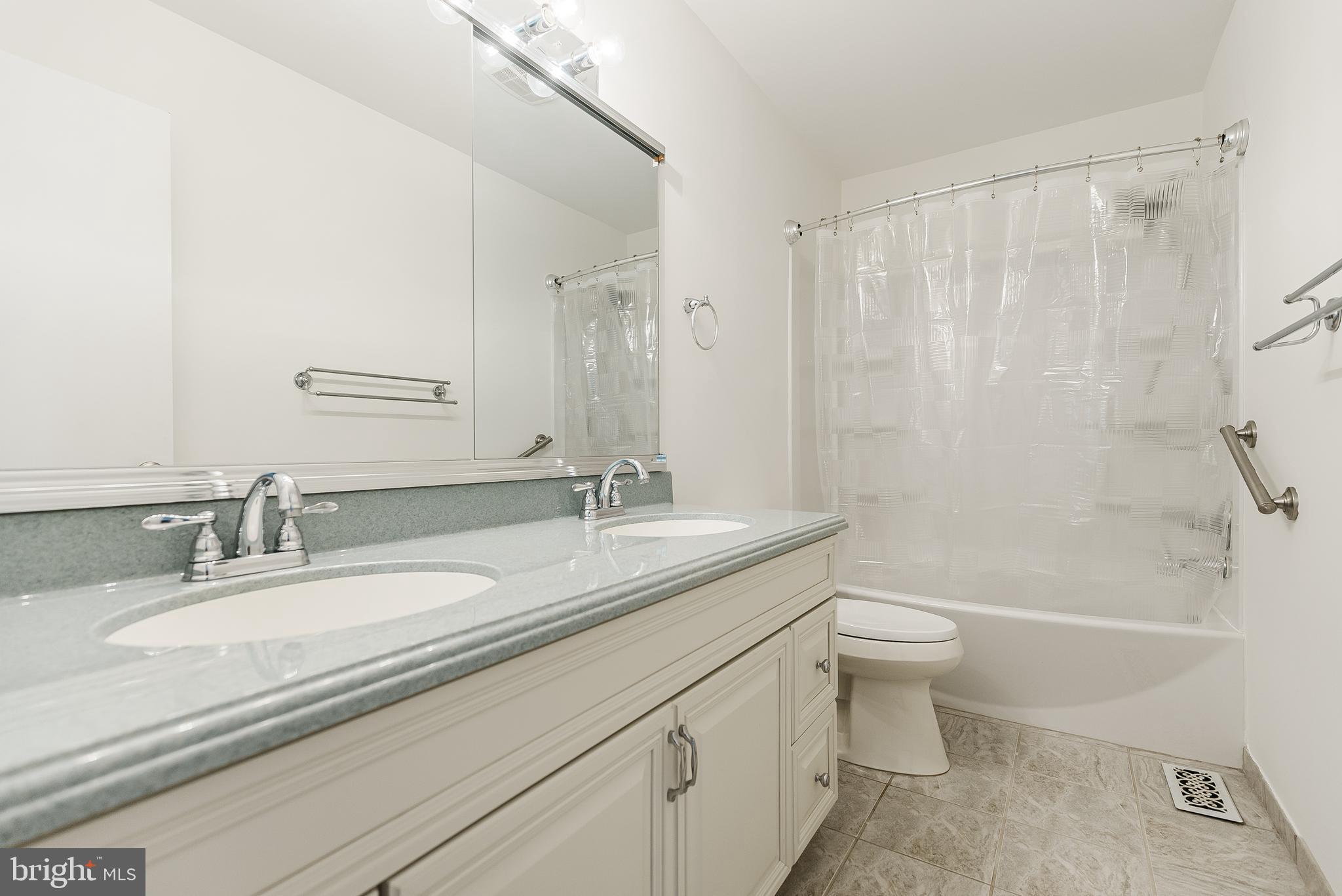 12 Victoria Court Mount Laurel, NJ 08054 - Photo 23 of 31 a bathroom with a granite countertop sink a toilet and a bathtub