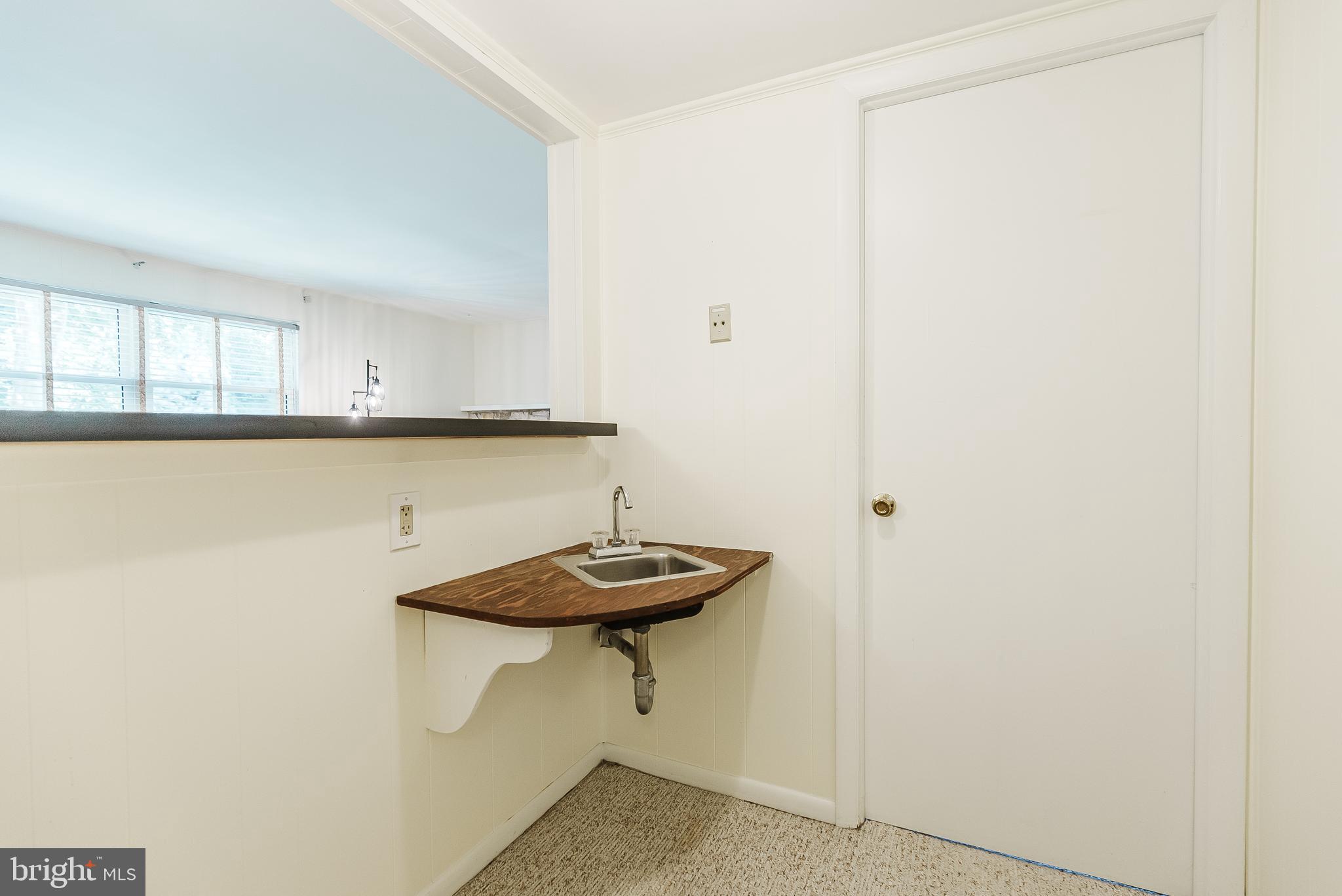 12 Victoria Court Mount Laurel, NJ 08054 - Photo 25 of 31 a view of a kitchen with a sink and a refrigerator