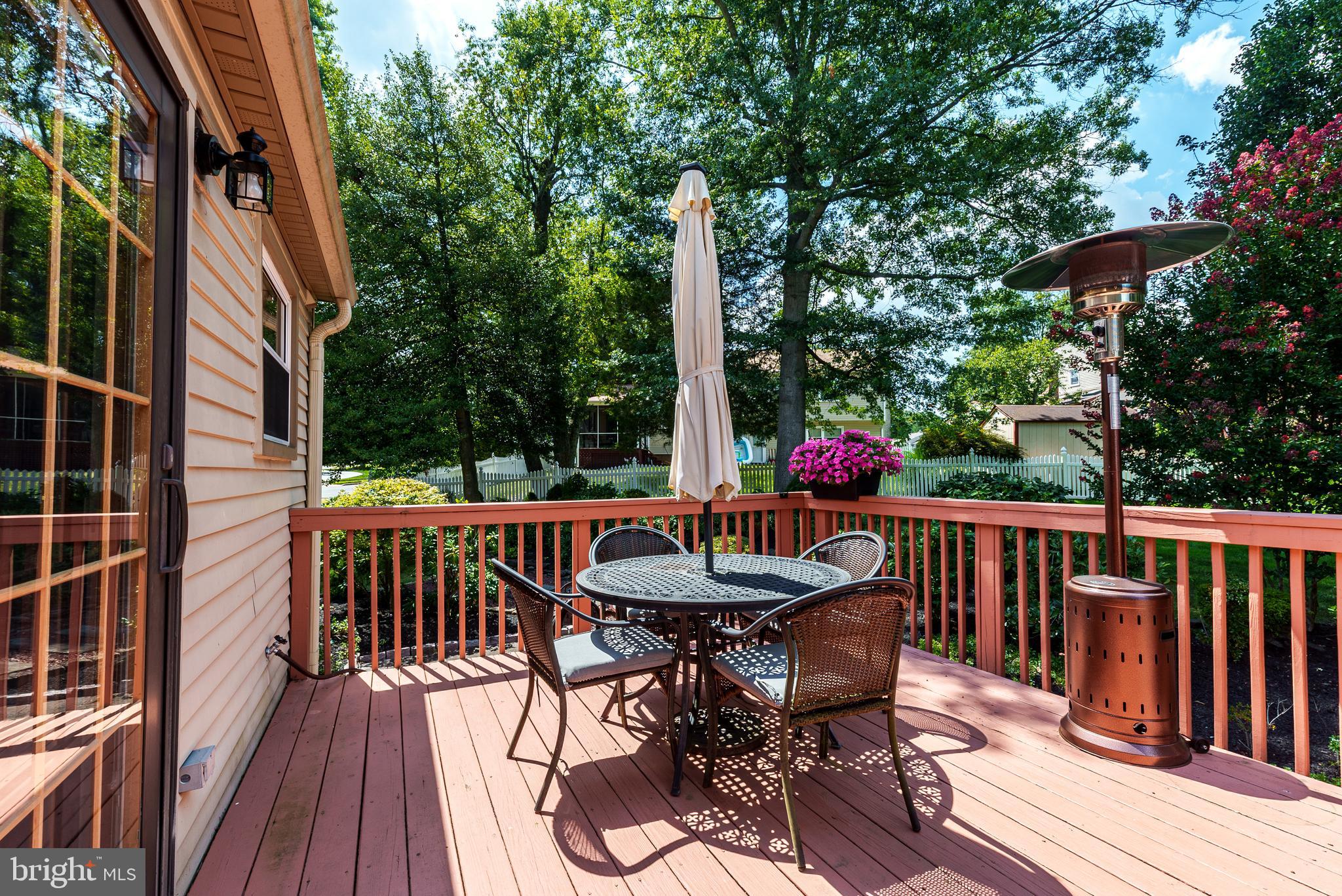 12 Victoria Court Mount Laurel, NJ 08054 - Photo 3 of 31 a balcony with wooden floor table and chairs
